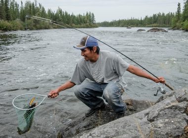 Orion McKay catches some pickerel for dinner on the Fawn River