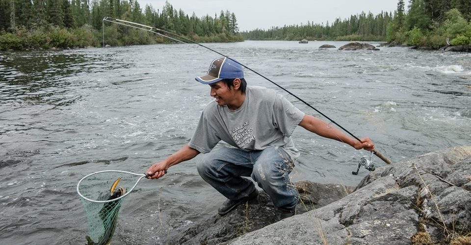 Orion McKay catches some pickerel for dinner on the Fawn River