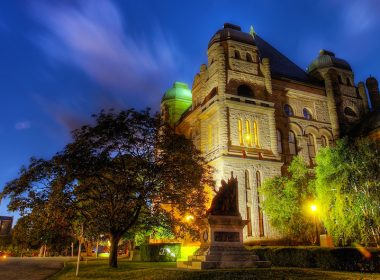 Queen's Park, Ontario parliament building at night.