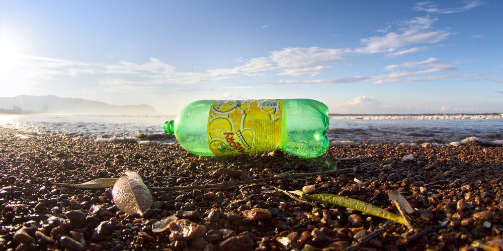 Plastic pop bottle on a beach in Costa Rica